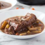 slow cooker pot roast plated in white bowl