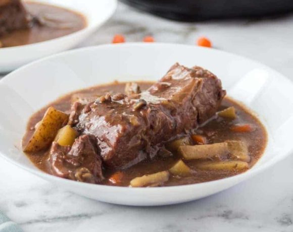 slow cooker pot roast plated in white bowl